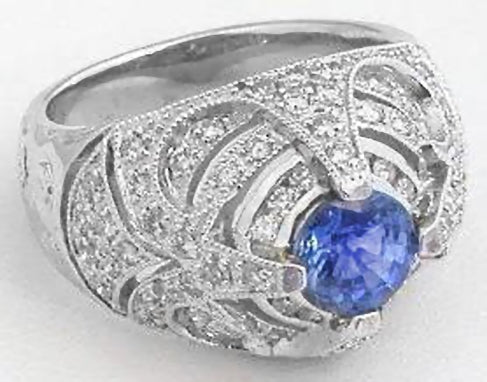 Stunning art deco design blue sapphire ring with pavé diamond accents in white gold