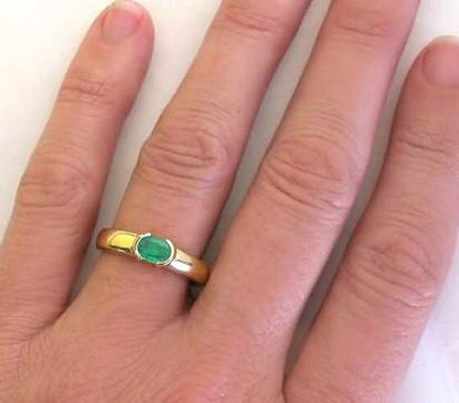 Real Oval Emerald Ring in 14k yellow gold - East West