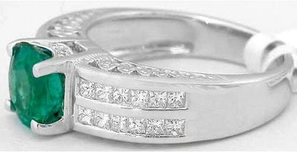 Two Rows of Channel Set Princess Cut Diamond Semi Mount Featuring Exception 7.1mm Round Natural Emerald in 18k