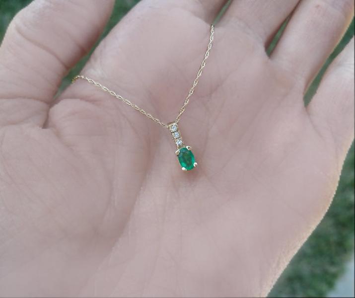 Oval Cut genuine emerald solitaire pendant with diamond bail in 14k yellow gold