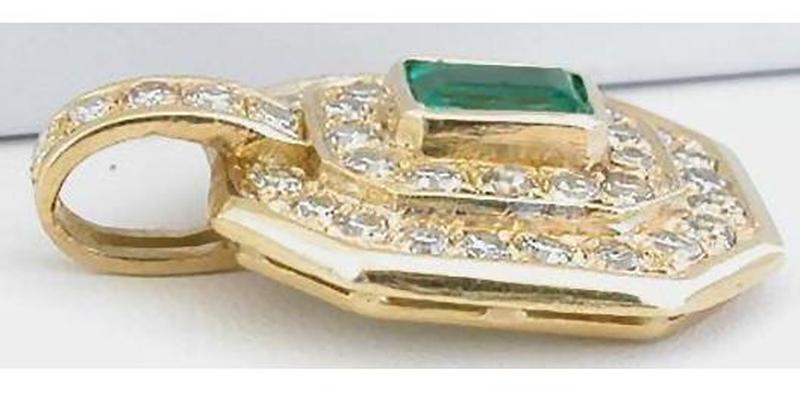 Side view of Emerald and Diamond Halo Pendant