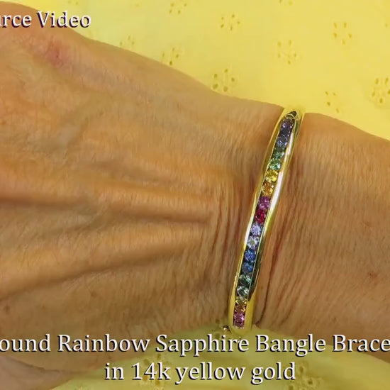Natural Rainbow Sapphire Bangle Bracelet in 21 grams of solid 14k yellow gold - Fits like a 7 inch bracelet (SSB-4027)