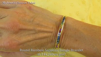 Natural Rainbow Sapphire Bangle Bracelet in 21 grams of solid 14k yellow gold - Fits like a 7 inch bracelet (SSB-4027)