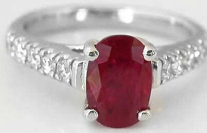 Oval cut natural sapphire ring in 14k white gold