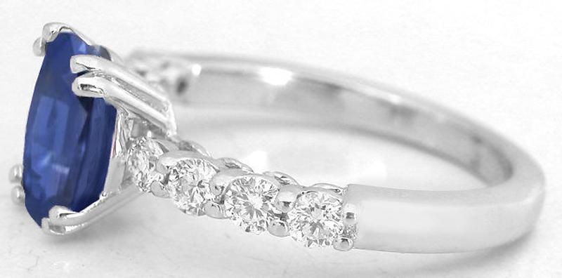 Oval Blue Sapphire Ring with Diamonds in 14k white gold