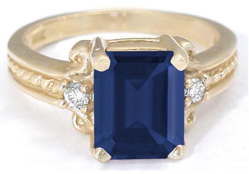 Emerald cut natural yellow sapphire ring in 14k yellow gold
