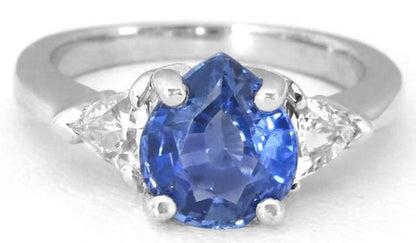 Blue and White Sapphire Ring: 1.94 ctw Ceylon Pear Blue and Trillon White Sapphire Past Present Future Ring in 14k white gold (SBR-110)