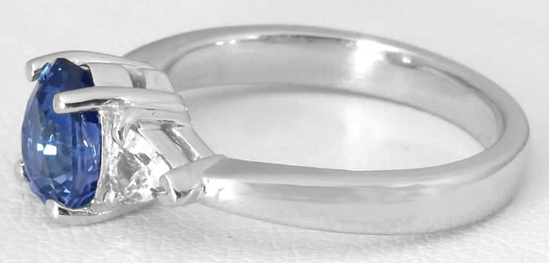 Natural Pear Blue Sapphire and White Trillion Sapphire Three Stone Ring in 14k white gold