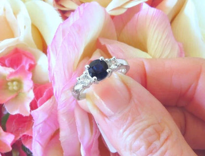 Natural Round Dark Blue Sapphire and White Sapphire three stone alternative engagement ring in 14k white gold for sale