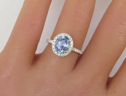 Natural unheated Ceylon sapphire halo ring with diamonds in white gold