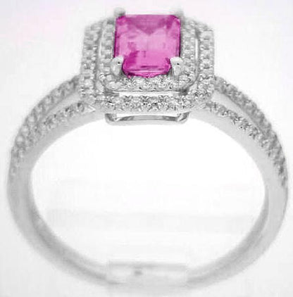 A silver-toned ring featuring a rectangular pink gemstone in a halo setting with a matching band paved with small clear stones, shown on a plain light background.