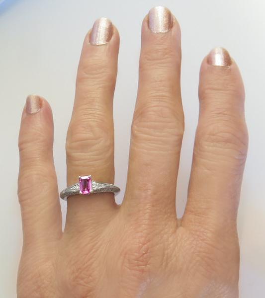 Natural Pink Sapphire in an Emerald Cut Setin in a Diamond Accented Simple Ring in 14k white gold
