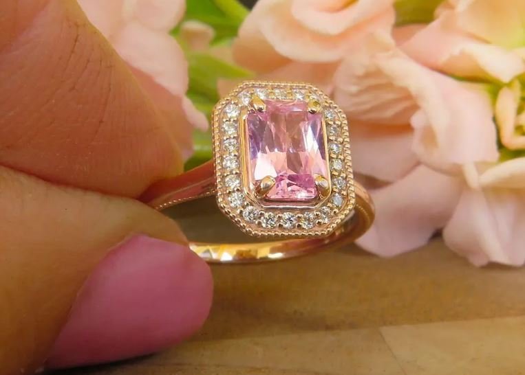 Octagonal halo ring with radiant pink sapphire and filigree basket