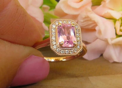 Octagonal halo ring with radiant pink sapphire and filigree basket
