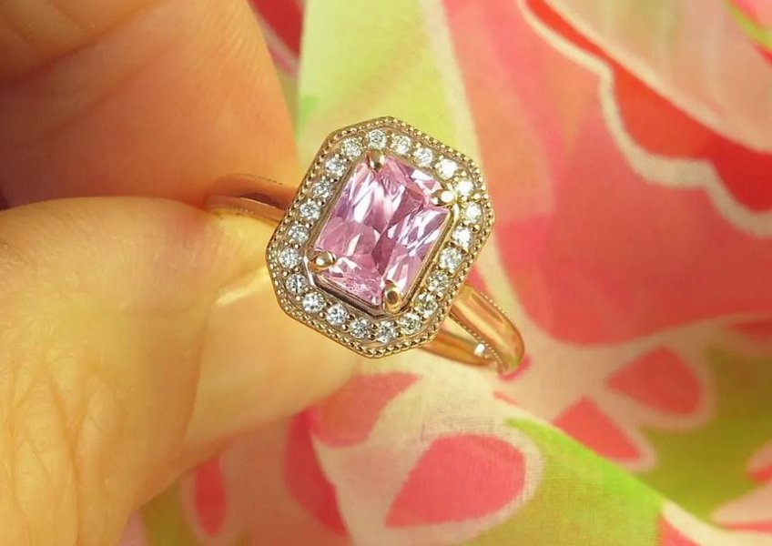 Vintage-style pink sapphire and diamond ring with milgrain details