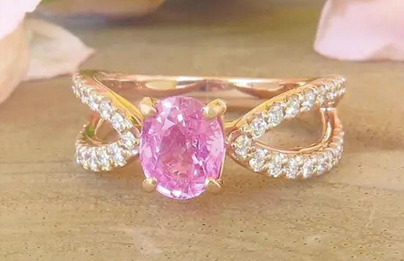 Oval pink sapphire ring in 14k rose gold with diamond split shank