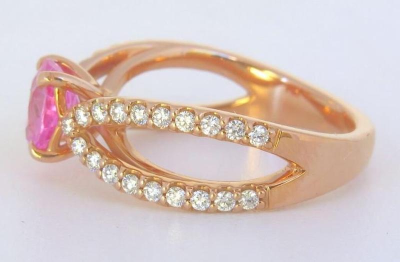 Bubblegum pink sapphire engagement ring accented with diamonds