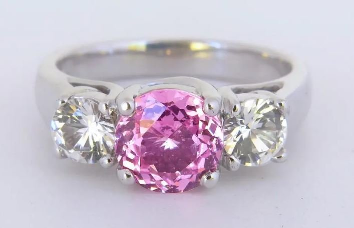 three-stone pink sapphire and white sapphire ring in 18k white gold