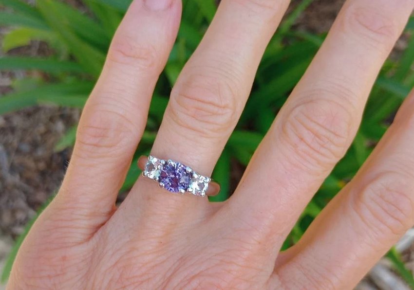 Unheated Ceylon purple sapphire with white sapphire accents