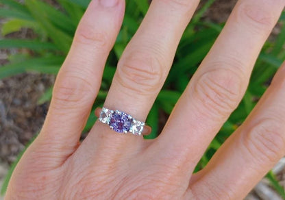 Unheated Ceylon purple sapphire with white sapphire accents