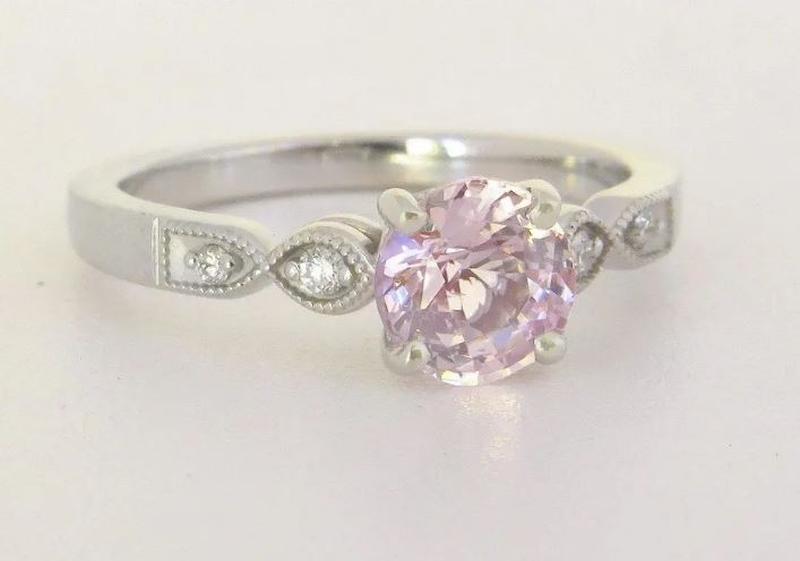 feminine pale pink sapphire and diamond ring in white gold band
