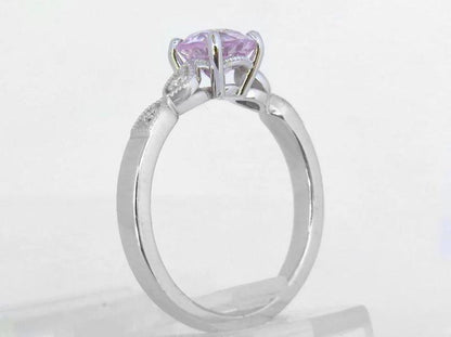 vintage inspired pink sapphire ring with marquise diamond details