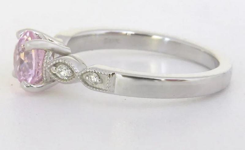 round 1.30 carat pink sapphire engagement ring with diamond accents