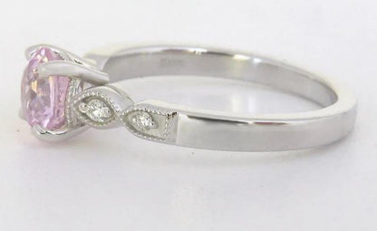 round 1.30 carat pink sapphire engagement ring with diamond accents