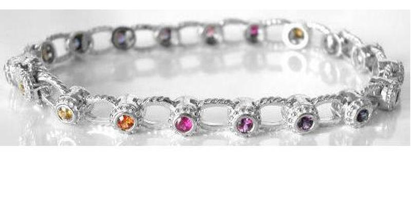 Bezel set natural round rainbow sapphire bracelet in solid 14k white gold. 7 inch.