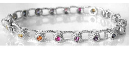 Bezel set natural round rainbow sapphire bracelet in solid 14k white gold. 7 inch.