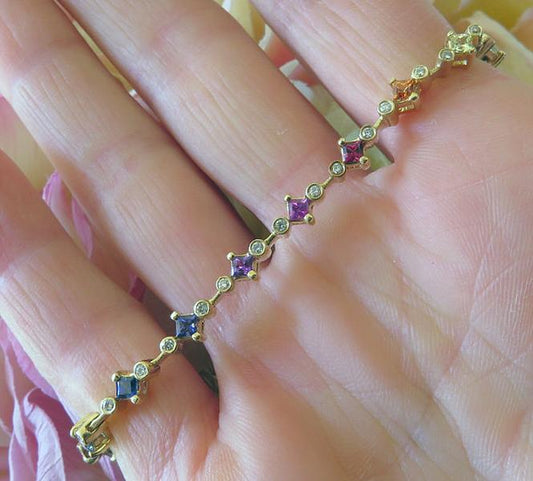 Natural Rainbow Sapphire Bracelet with alternating princess cut sapphires and real diamonds in solid 14k yellow gold