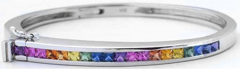 Natural Rainbow Sapphire Bangle Bracelet in solid1 4k white gold with channel set real princess cut sapphires.