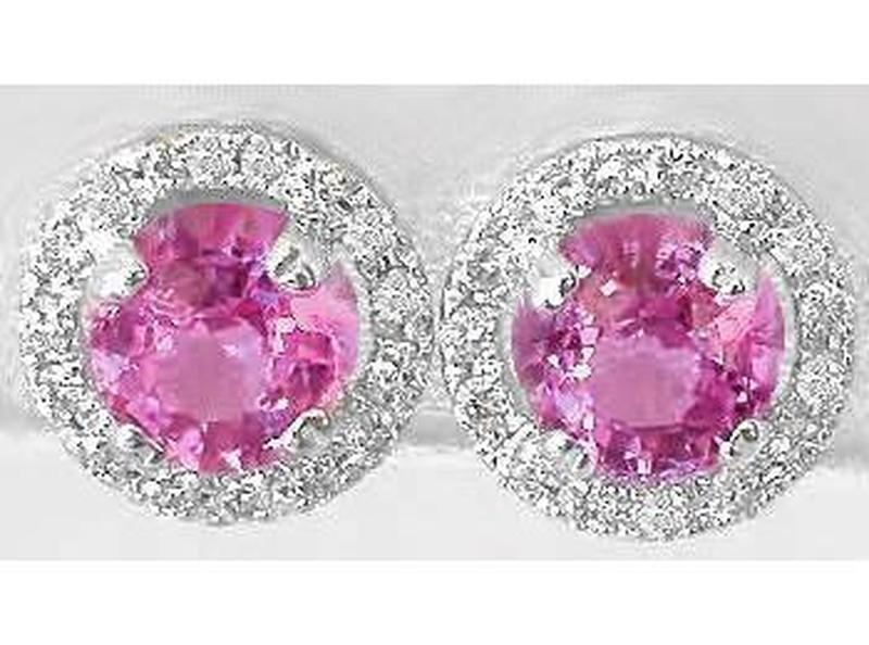 Round cut natural pink sapphire ring in 14k white gold