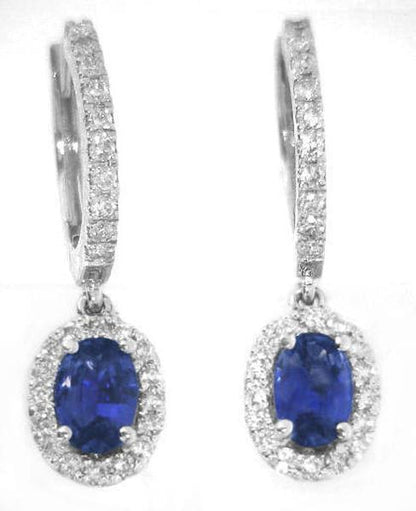 Oval cut natural sapphire ring in 14k white gold