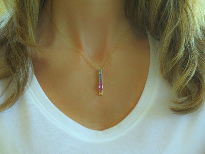 Pink Sapphire Stick Pendent with Multicolor Sapphires set in 14k yellow gold. Gold chain included.