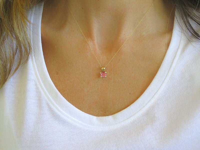 Feminine Emerald Cut Pink Sapphire and Diamond Pendant in 14k yellow gold