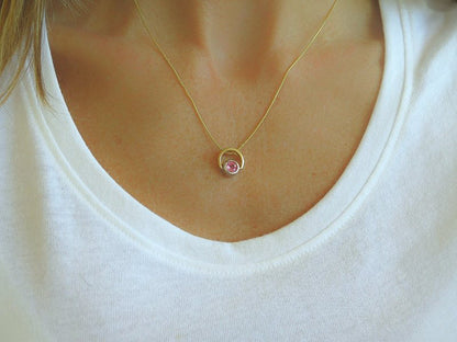 Pink Sapphire Solitaire Pendant in 14k white and yellow gold