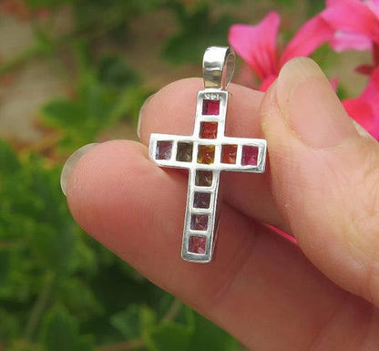 Princess Cut Rainbow Sapphire Cross Pendant in 14k white gold. Channel Set Genuine Sapphires.
