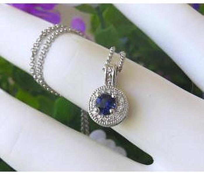 Round Natural Sapphire Pendant with a Diamond Halo in solid 14k white gold for sale