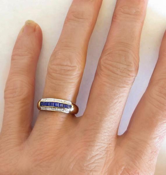 Women's Natural Blue Sapphire Channel Set Anniversary Ring with Diamond Accents in solid 14k yellow gold