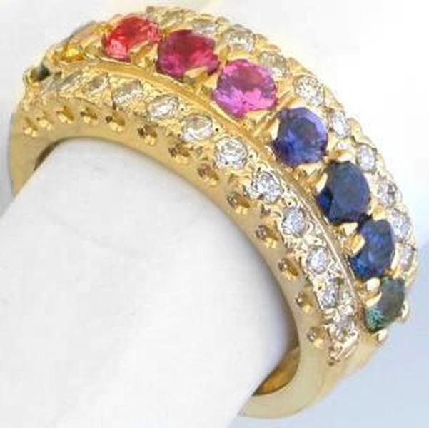 Side View of Stunning Three Row Natural Rainbow Sapphire Anniversary Band Ring in 14k yellow gold