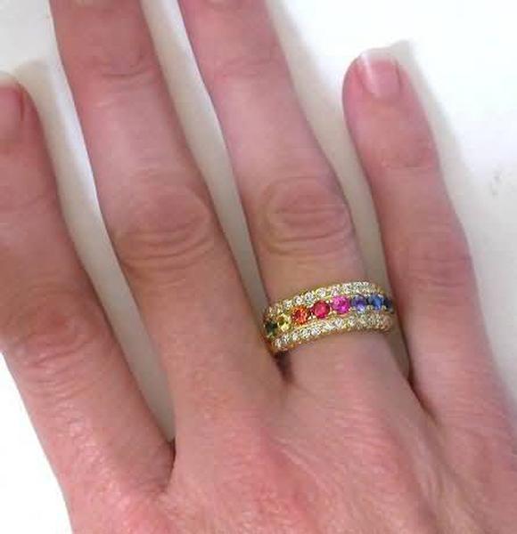 Signature Ring with Premium Quality Natural Rainbow Sapphires and Near Colorless Fine Diamonds in 14k yellow gold shown on the hand
