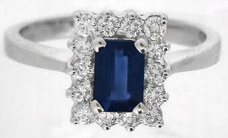 Emerald cut natural blue sapphire ring in 14k white gold