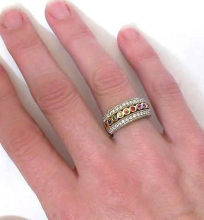 Fancy Sapphire Wedding Band Anniversary Ring with Three Rows of Fine Diamonds and Natural Sapphires shown on the hand
