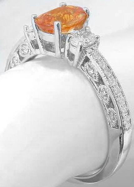 1 carat Oval Natural Orange Sapphire and 0.42 carat Oval Diamond Engagement Ring in 14k white gold - Vintage Design