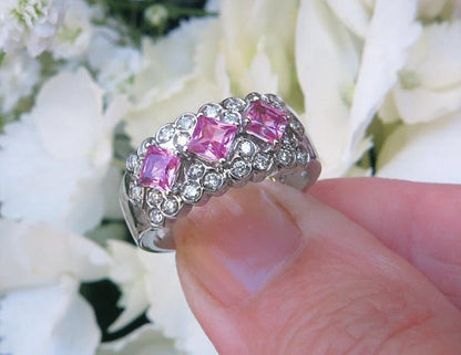 Unique Natural Pink Sapphire Anniversary Band with Diamonds. Diagonal set princess cut sapphires in solid 14k white gold. Real Sapphires set on the diagonal