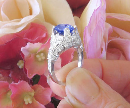 Real Platinum Natural Oval Ceylon Blue Sapphire Ring in a vintage design real diamond mounting for sale
