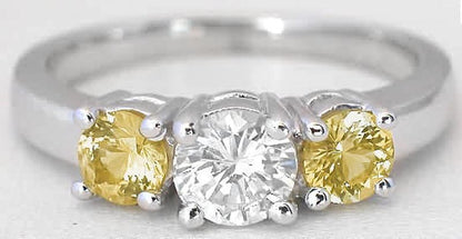 Round cut natural yellow sapphire engagement ring in 14k white gold