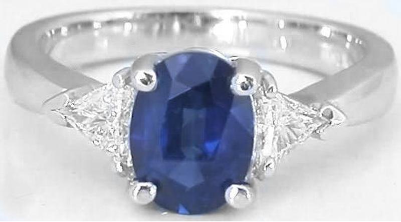 Trillion cut natural blue sapphire engagement ring in 14k white gold