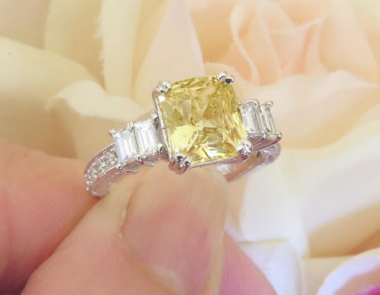 One of a kind Unheated Natural Yellow Sapphire Ring featuring double baguette diamonds and round diamonds in vintage design
